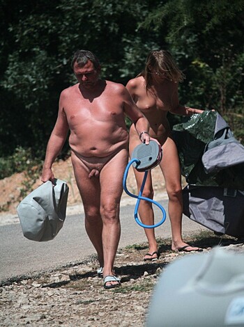 Vulgar description:
Here's a fucking picture of two naked assholes going for a stroll, ya bitches!