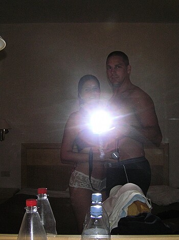 Vulgar description: "Fuckin’ hot couple jerkin’ each other off in the fuckin’ mirror, both bare-assed."