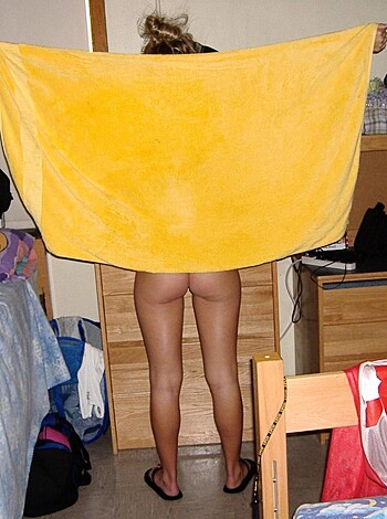 """
Nude chick laying on mattresses with her legs spread open.
"""
