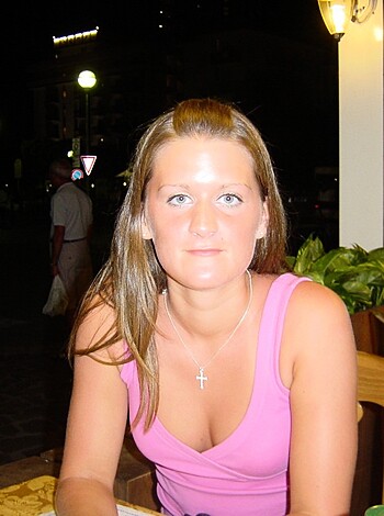 "Here's a picture of a hot blonde chick in a fucking adorable pink sleeveless top."