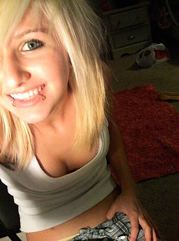 """
A chick with a fucking nose tat is wearin' some checkered ass pants.
"""