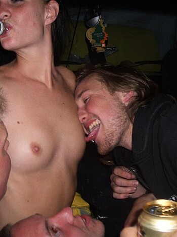 """
Fucking hot bitch with tits, chugging liquor while dudes suck on her fucking nipples.
"""