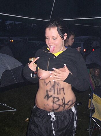 """
Party chick flashing her tits.
"""