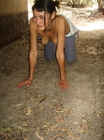 "Here's a fucking picture of some bitch squatting in the goddamn mud, covered in autumn foliage."