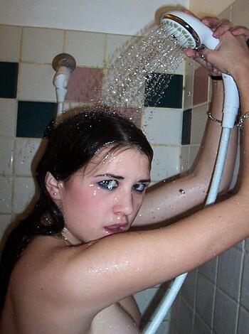 Here's a fucking shower scene with someone standing in it, probably waiting for the water to get hotter or cooler, who the fuck knows.