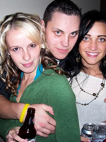 "Three drunken idiots getting cozy with each other, laughing their asses off."