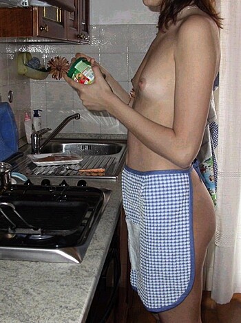 """
A bare-breasted bitch whipping up grub in the buff.
"""