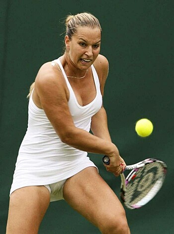 "Look at this fucking hot babe smashing balls on a goddamn court like a motherfucking pro. She's got the whole goddamn place sweating while she slams that yellow ball like a goddamn champ."