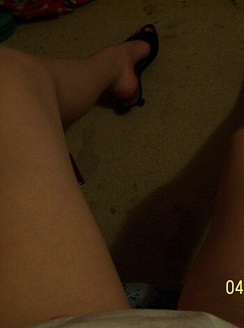 This is an image of some sexy ass bare legs with freaking gorgeous sandals and towering fucking heels, man!