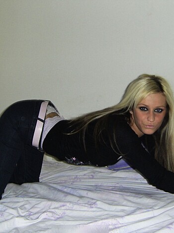 "Here's a hot babe with perfect tits rocking a tight blue jean shorts and a fuckin' sexy black T-shirt, all barefoot for your viewing pleasure. Enjoy the show, motherfucker."