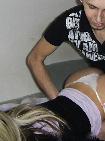 A horny couple having sex with the guy rubbing lotion on his partner's ass cheeks.