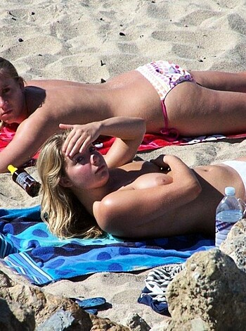 Vulgar description:
"Check out these two titties bouncing around on the fucking beach."