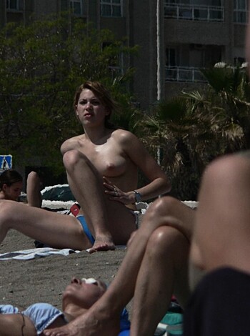 VOYEUR ON THE BEACH - Photo 226