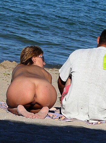 VOYEUR ON THE BEACH - Photo 236