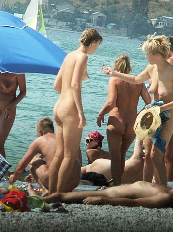 VOYEUR ON THE BEACH - Photo 243