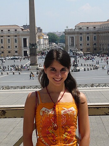"""
Fuck this bitch looks like a goddamn tourist at some lame-ass sight. Her fucking ass is showing in that skimpy motherfucking dress, but at least her tits are perky.
"""