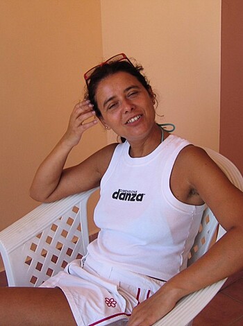 Look at this f*cking picture of some bitch chillin' in her f*cking white tank top and n*gga shorts, bro.
