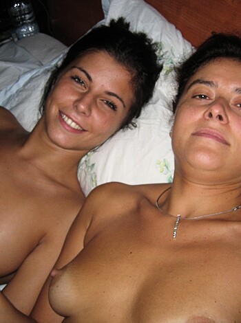 "Here's two naked tits-out chicks fuckin' cuddlin' on a bed."