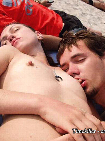 Here's the vulgar description:
"Two hairy dudes suckin face, ass crack showin; one naked chest."