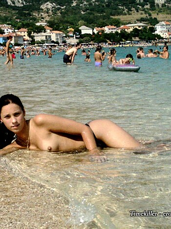 "Look at this fucking bitch lying flat on her tits on the sandy shoreline, all smug with her sun-kissed skin glowing in the afternoon light."