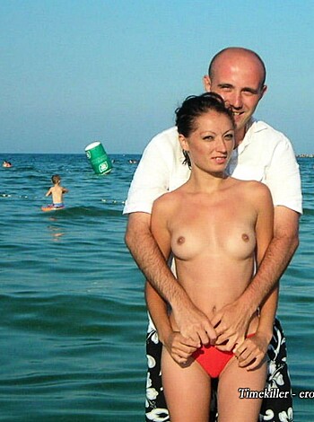 "Here's a dick pic of some chick trying to get her cock sucker man to take his clothes off so they can fuck in the ocean, while she's naked ass showing."