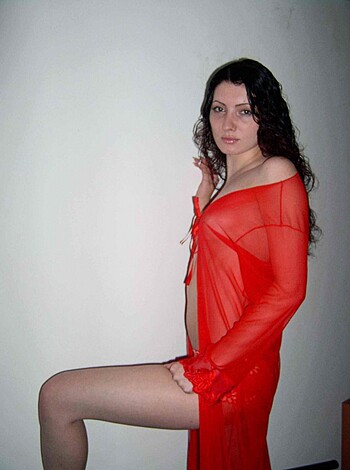 "This here picture is all about some fuckin' hot bitch, wearing one sexy ass red-ass dress."