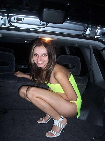 "Check out this pic of some hot chick with her tits hanging out and her pussy all drippin' wet, caught on camera takin' a ride in some expensive ass car."