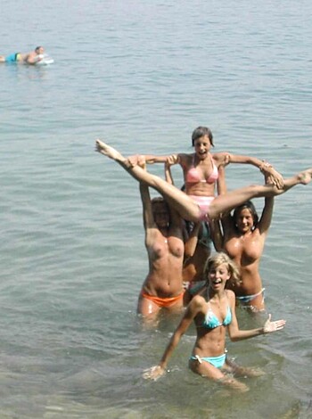 """
A bunch of fucking bitches frolicking on the goddamn beach in their slutty ass bathing suits.
"""