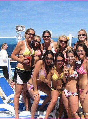 Vulgar, factual description: "Look at these hot chicks showing off their tits and asses in barely any clothes!"