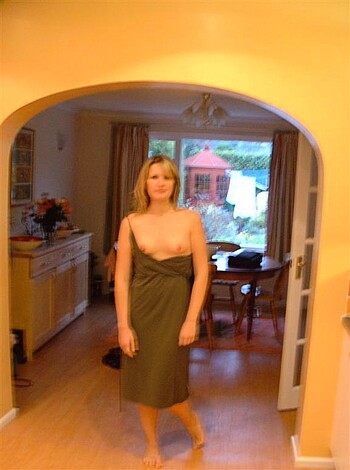 "Fucking hot chick with fucking sexy legs in her slutty ass dress, standing inside."