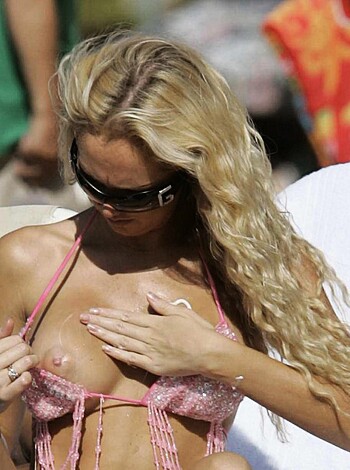 "Check out this hot ass bitch exposing her tits at the fucking pool party."