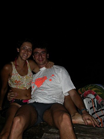 Fuckin' assholes sittin' tight together on sandy shore at fuckin' dark.