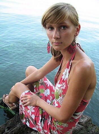 F*cking hell, bitch! Why the f*ck are you wearing that ugly ass flower patterned dress so close to the goddamn water? Are you trying to get your f*cking self wet or some shit? Jesus Christ, what a f*cking idiot.