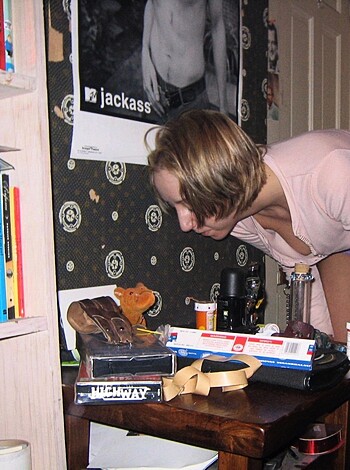 Vulgar description: Lookin' at some fucking phone while shit-smearin' her cracked pussy wide open like a damn pez dispenser.