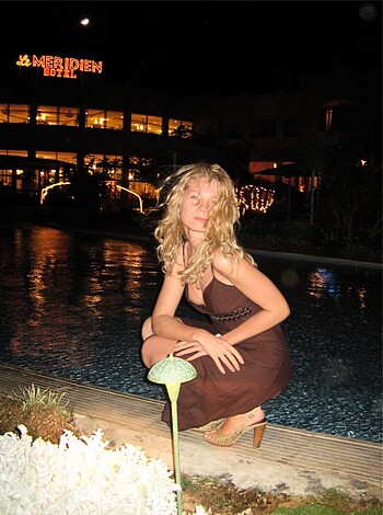Fucking bitch is sittin on a fuckin ledge with her fuckin legs open, showing off that tight pussy and her hairy cunt.