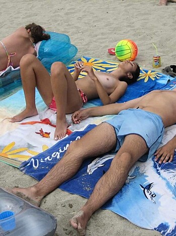 Vulgar description: Look at these dumbasses fuckin' up their tan lines while chugging beers and kickin' around a goddamn soccer ball like they're some kind of fuckin' superstars.