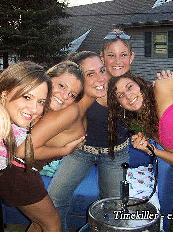 """
Hot chicks grinning on the grass in their skimpy beach wear, flashing some tits and ass while taking a photo op.
"""