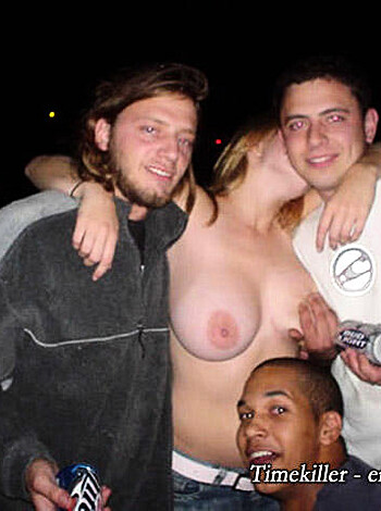 "Here's three dudes getting wasted with their tits hanging out while one dude checks out some boob action on a chick without a bra."