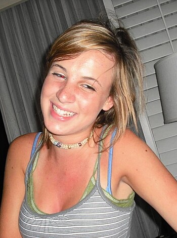 "This bitch is wearing a fuckin' tight-ass tank top while she grins her cunt up."