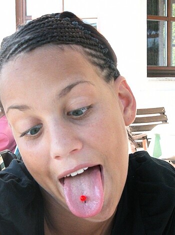 "This image depicts a bitchy teenage slut licking her smug, dirty pussy like a motherfucking pro."