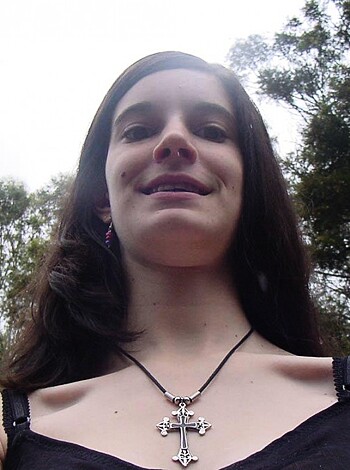 Vulgar description: This image depicts a busty broad with perky tits and a slender neck, perfect for sucking and fucking.
