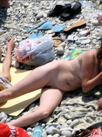 Orgy at a public nude beach - Photo 7