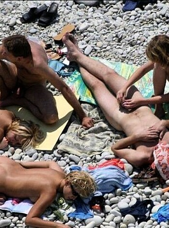 Orgy at a public nude beach - Photo 6