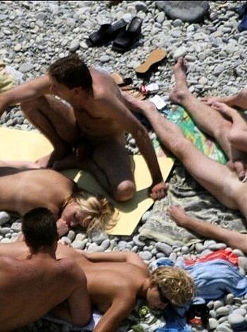 Orgy at a public nude beach - Photo 5