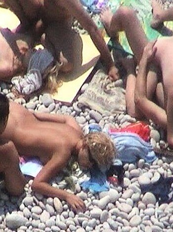 Orgy at a public nude beach - Photo 8