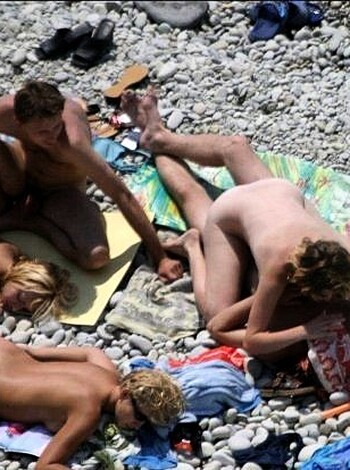 Orgy at a public nude beach - Photo 10