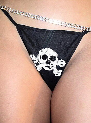 Vulgar, factual description of image: "Look at this skull-fucking thong on that bitch's ass."