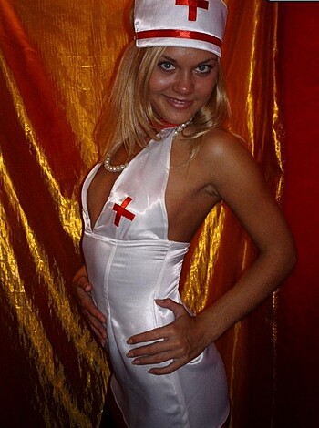 """
Chick in tight sexy nurse get-up gets you hard.
"""