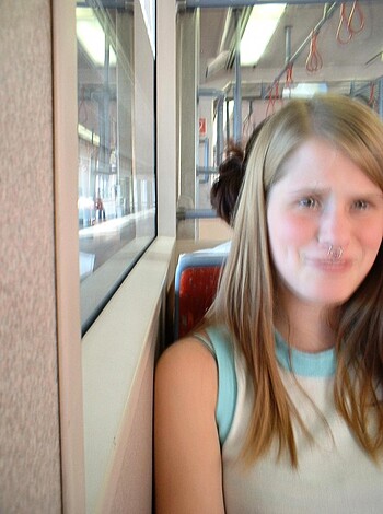"""
Here's an image of a bitch on a train, getting fucking comfy.
"""