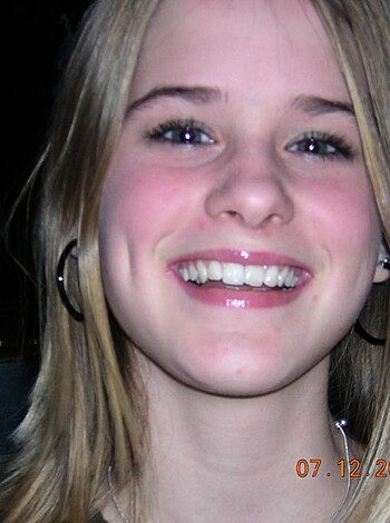 "This b*tch is looking all f*cking happy with her sh*t-eating grin."